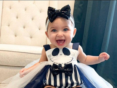 Girls Skeleton Romper: Halloween Costume with Sequin Bow